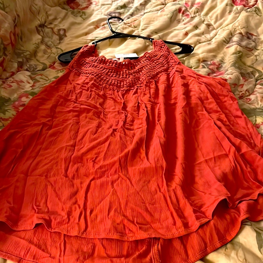 Bright and cheerful orange top. Brand new with tags Maurice’s 2x